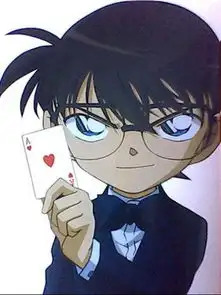 求动漫图片男生手拿扑克牌的图

