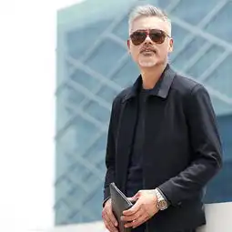 2018秋冬翻领纯色宽松休闲中年男性夹克
