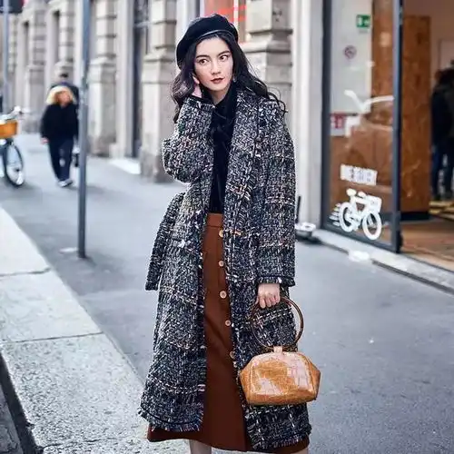 风情万种全由它,女神必选款,呢大衣让你在年会上惊艳
