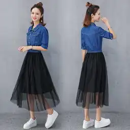 穿套装的好处不仅在于省去了搭配的烦恼,好能穿出时尚感
