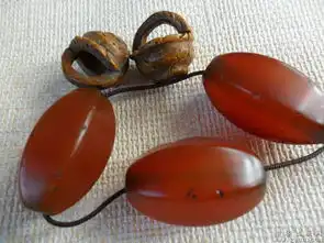 包老辽金红玛瑙六菱珠子3颗

