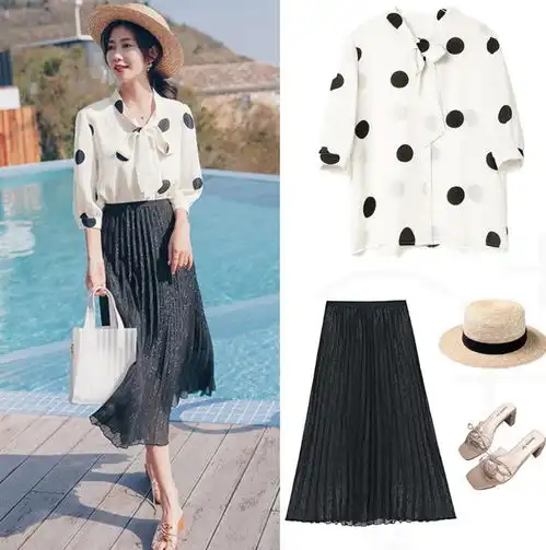 40岁女人穿衬衫长裙,显得优雅有气质,体现出柔美的风范来
