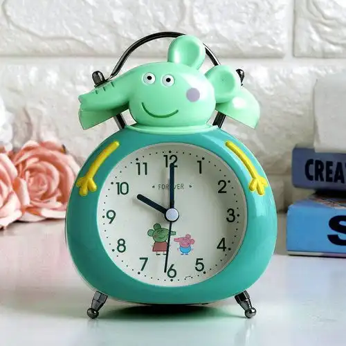创意可爱卡通闹钟金属静音带灯儿童学生起床铃小黄人台钟闹钟l
