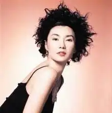 张曼玉杂志拍照亲自设计造型风情万种
